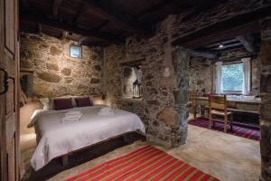 Postel nebo postele na pokoji v ubytování Μilia Mountain retreat