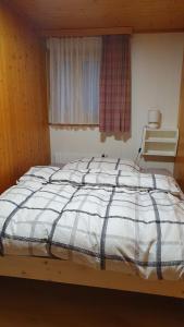 Postel nebo postele na pokoji v ubytování Chalet Falk