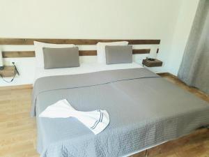 Postel nebo postele na pokoji v ubytování Hotel Salinas São Jorge