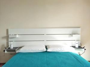 Letto o letti in una camera di B&Bob Private Apartment in Bari