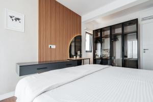 Katil atau katil-katil dalam bilik di Olive Tree Apartments by In Property