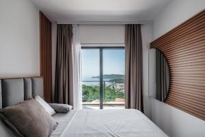 Katil atau katil-katil dalam bilik di Olive Tree Apartments by In Property