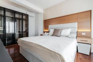 Katil atau katil-katil dalam bilik di Olive Tree Apartments by In Property