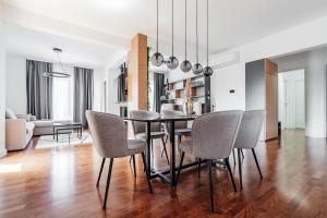 Ruang duduk di Olive Tree Apartments by In Property