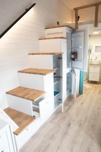 Kuchyň nebo kuchyňský kout v ubytování Tiny House Le Poulailler
