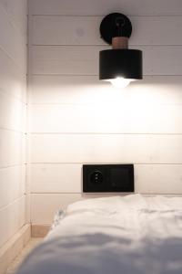 Postel nebo postele na pokoji v ubytování Tiny House Le Poulailler