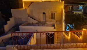 a view from a balcony of a building at night at KING SOLOMON PALACE in Avanos