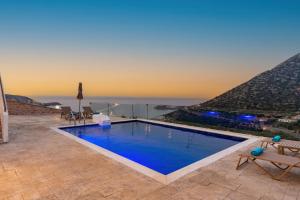 a villa with a swimming pool with a view at Brikis Villa 1 - With Private Pool in Bali
