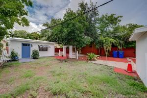 a house with a yard in front of it at Cute Private Room - Close to airport & Free parking 01 in Miami