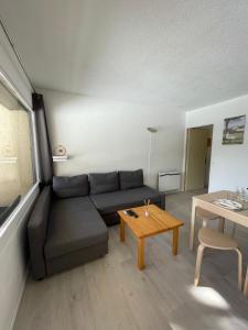 Posezení v ubytování Joli studio près de la forêt