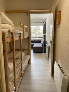 Postel nebo postele na pokoji v ubytování Joli studio près de la forêt