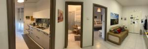 TV a/nebo společenská místnost v ubytování Il profumo dei Sassi Holiday Home
