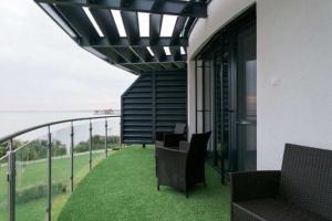 A balcony or terrace at Apartman Balaton