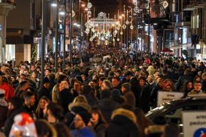 a large crowd of people walking down a street at AL VECCHIO ARCO a Bari vecchia in Bari