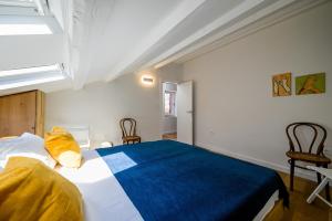 Łóżko lub łóżka w pokoju w obiekcie Casale Piazzetta