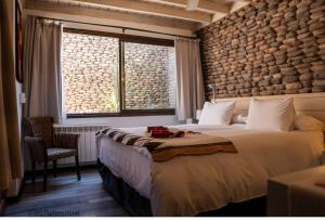 Postel nebo postele na pokoji v ubytování Terrantai Lodge