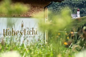 a sign on the side of a building at Boutique Hotel Hohes Licht in Damuls +80 photos