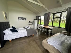 Arhus Cottage and Camping客房内的一张或多张床位