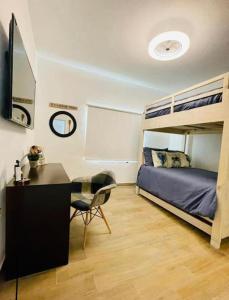 Ένα ή περισσότερα κρεβάτια σε δωμάτιο στο Casa con alberca privada climatizada, Pasos-Playa +15 φωτογραφίες