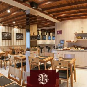 ห้องอาหารหรือที่รับประทานอาหารของ Bellagio Mini Resort - no coração de Gramado