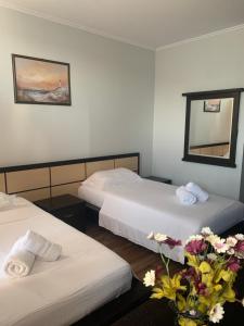 Hotel Dodona 객실 침대
