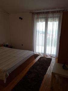 Postel nebo postele na pokoji v ubytování Villa Oliva