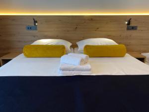 Postelja oz. postelje v sobi nastanitve Hotel Leonardo