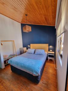 Postel nebo postele na pokoji v ubytování Reñaca House B&B