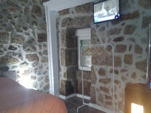 Μια τηλεόραση ή/και κέντρο ψυχαγωγίας στο Akivillas Celorico Brick