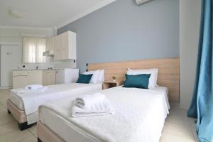 Postel nebo postele na pokoji v ubytování SeaShore Living