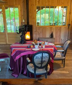 Posezení v ubytování Chambre d'hôtes sous la canopée