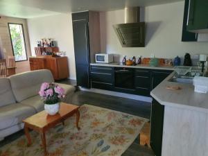 Η κουζίνα ή μικρή κουζίνα στο Cottage agréable et chaleureux