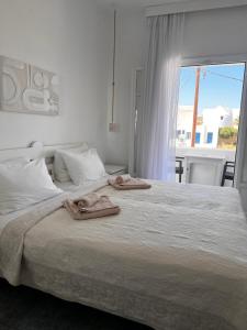 A bed or beds in a room at Vavanos Studios