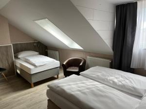 Ένα ή περισσότερα κρεβάτια σε δωμάτιο στο Skyline Hotel Hannover
