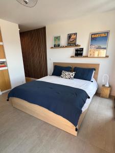Een bed of bedden in een kamer bij Canta la Mar - Vue exceptionnelle