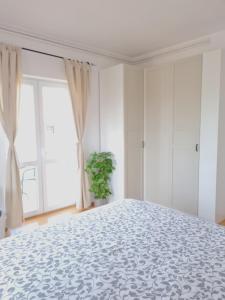 Postel nebo postele na pokoji v ubytování Rooms and Apartments Robert