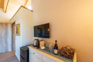 TV a/nebo společenská místnost v ubytování LeCoste rooms, Monforte
