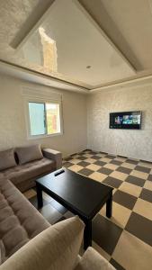 Χώρος καθιστικού στο Appartement 1 vue sur mer à Azla