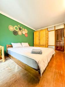 Postel nebo postele na pokoji v ubytování Bamboo Home