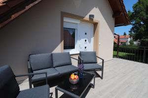 Posezení v ubytování Golden Apartman Balatonlelle