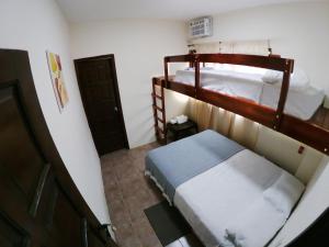 an overhead view of a bedroom with two bunk beds at Hotel Estación del Sol in Las Núñez