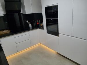 Kuchyň nebo kuchyňský kout v ubytování Residom + 3 fotografie