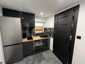 Η κουζίνα ή μικρή κουζίνα στο Willa przy Krupówkach