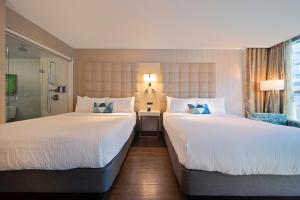 Katil atau katil-katil dalam bilik di Hotel BLU