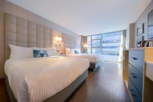 Katil atau katil-katil dalam bilik di Hotel BLU