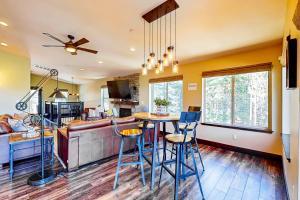 a kitchen with a table and chairs in a room at Pooewin Place in South Lake Tahoe