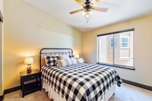 a bedroom with a bed and a window at Pooewin Place in South Lake Tahoe
