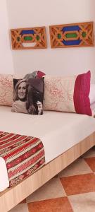 Łóżko lub łóżka w pokoju w obiekcie SULTANA Beach Riad