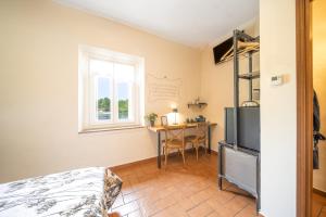 Kuchyň nebo kuchyňský kout v ubytování B&B Osteria dello sperone