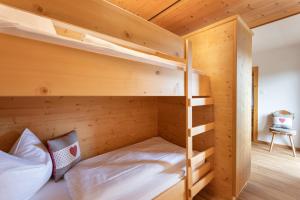 Tempat tidur dalam kamar di Eden Appartements